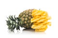 Fresh juicy nutritious cut pineapple with whole fruit as backgro Royalty Free Stock Photo