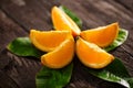 Fresh and juicy orange slice fruits on table Royalty Free Stock Photo