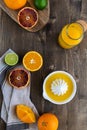 Fresh juicy oranges halved,limes, grapefruits, fresh squeezed orange juice Royalty Free Stock Photo