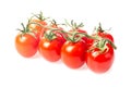 Fresh juicy red cherry tomato bunch closeup isolated on white background. Royalty Free Stock Photo