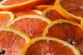 Fresh juicy orange fruit rings close up background. Royalty Free Stock Photo