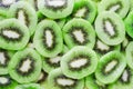 Fresh and juicy sliced kiwi fruit background Royalty Free Stock Photo