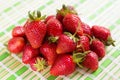 Fresh juicy strawberries lying on the table. Royalty Free Stock Photo