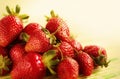 Fresh juicy strawberries lying on the table. Royalty Free Stock Photo