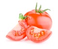 Fresh juicy tomato and two slices of tomatoes Royalty Free Stock Photo