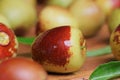 Fresh jujubes fruit on wooden table.