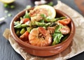Fresh jumbo shrimps and green asparagus, delicious dish