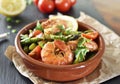 Fresh jumbo shrimps and green asparagus, delicious dish