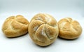Fresh Kaiser rolls baked bread.