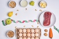 Fresh keto food and measuring tape on white background. Top view