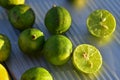 Fresh key lime fruit cut in half Royalty Free Stock Photo