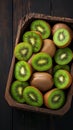 Fresh kiwi fruit arranged on rustic wooden background, juicy slices Royalty Free Stock Photo