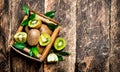 Fresh kiwi fruit in the basket. Royalty Free Stock Photo