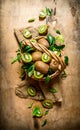 Fresh kiwi fruit in an old basket with leaves. Royalty Free Stock Photo