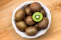 Fresh kiwi fruit in a wickere basket Royalty Free Stock Photo