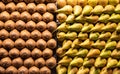 Fresh Kiwi and Pear fruits on a fruit market for a healthy lifestyle