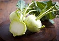 Fresh kohlrabi on the wooden table