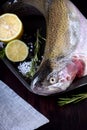 Fresh lacustrine trout on black tray Royalty Free Stock Photo