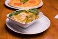 Fresh lasagna in a white plate