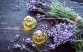 Fresh lavender with essential oil on rustic wood Royalty Free Stock Photo