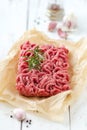 Fresh lean beef mince on parchment paper