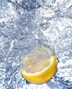 Fresh lemon in cold water Royalty Free Stock Photo