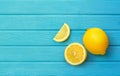 Fresh Lemon with cut in half and sliced on blue wood Royalty Free Stock Photo