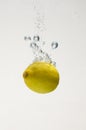 Fresh lemon drop on water with babble Royalty Free Stock Photo