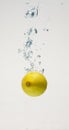 Fresh lemon drop on water with babble Royalty Free Stock Photo