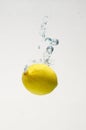 Fresh lemon drop on water with babble Royalty Free Stock Photo