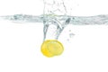 Fresh lemon dropped into water splashing Royalty Free Stock Photo