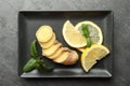 Fresh lemon, ginger and mint on grey table, top view Royalty Free Stock Photo