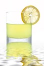 Fresh lemon juice with a slice Royalty Free Stock Photo