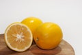 Fresh lemon on the kitchen wooden board Royalty Free Stock Photo