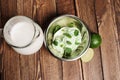 Fresh lemon and lime homemade ice cream in a white cup of milk Royalty Free Stock Photo