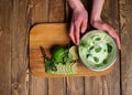 Fresh lemon and lime homemade ice cream in a white cup of milk Royalty Free Stock Photo