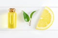 Fresh lemon slice and essential oil