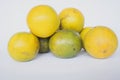 fresh lemon slice, orange slice, , citrus sinensis, green lemon, yellow lemon in white background