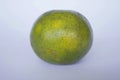 fresh lemon slice, orange slice, citrus sinensis, green lemon, yellow lemon in white background