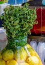 Fresh lemon water lemonade detox water in large vase glass during hotel brunch buffet in the garden