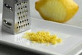 Fresh lemon zest and grater Royalty Free Stock Photo