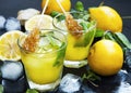 Fresh lemonade drinks glasses with mint leaves,lemons, ice cubes Royalty Free Stock Photo