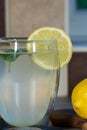 Fresh lemonade. Glass of authentic home-made lemon drink