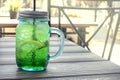 Fresh lemonade on wooden background in summer cafe Royalty Free Stock Photo