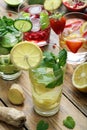 Fresh lemonades with strawberries,lemons, garnet, cucumbers and mint leaves.