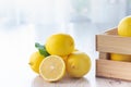 Fresh lemons on bright kitchen table Royalty Free Stock Photo