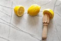 Fresh lemons and citrus reamer on marble Royalty Free Stock Photo