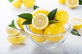 Fresh lemons in a glass bowl Royalty Free Stock Photo