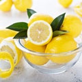 Fresh lemons in a glass bowl Royalty Free Stock Photo