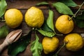 Fresh lemons with leaves in rustic wooden box Royalty Free Stock Photo